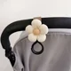 thumbnail image 4 of Gancho para cochecito de bebé, carrito de flores dulces, bolsa colgante de paraguas, gancho de bucle de almacenamiento, suministros infantiles, accesorios de almacenamiento, 4 of 6