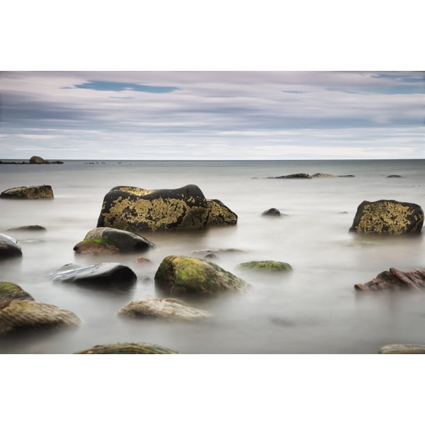Large rocks sitting in the water Poster Print (38 x 24) - Walmart.ca