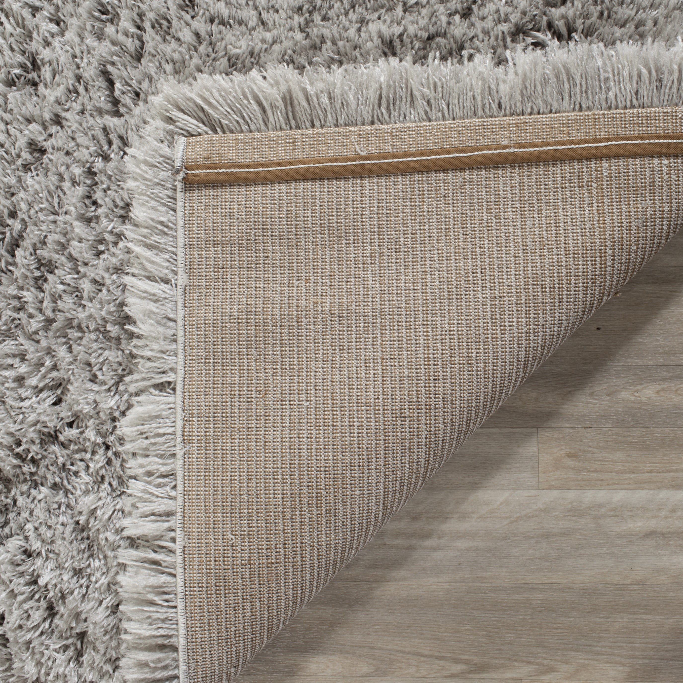 SAFAVIEH Polar Abbot Solid Shag Area Rug, Silver, 5'1" x 7'6"