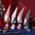 thumbnail image 3 of Muñeco de peluche navideño YUANXCMXG sin rostro con patas retráctiles y sombrero largo 60x19cm, 3 of 5