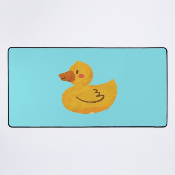 Un nuevo tapete de escritorio con forma de pato de juguete amarillo