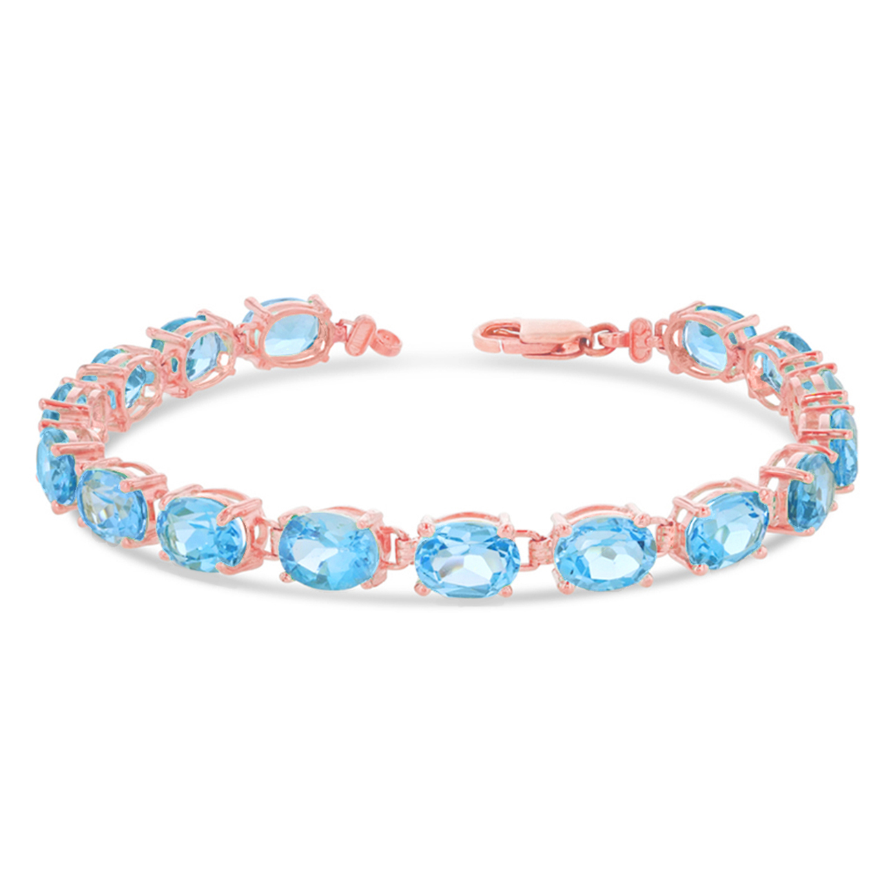OVAL GENUINE BLUE TOPAZ (8 X 6) TENNIS BRACELET IN ROSE GOLD : 10K 6.5"