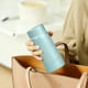 thumbnail image 5 of Taza térmica de titanio de 200 ml | Taza de viaje con aislamiento al vacío de doble pared | Revestimiento interior de titanio | Tamaño compacto de bolsillo | Capacidad de 200 ml | Azul, rosa,, 5 of 6