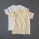 thumbnail image 3 of Camiseta de manga corta de algodón puro suave en color albaricoque leche, corte holgado para hombres y mujeres, estilo de viaje al trabajo de verano, cuello redondo, 3 of 4