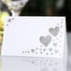 thumbnail image 4 of Cateissary 50 Uds. Impresión duradera de papel con tarjetas de nombre de ahuecadas en el corazón tarjetas de nombre de boda duraderas Kits de decoración para fiestas blanco, 4 of 6