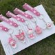 thumbnail image 2 of Juego de llaveros de la serie Sakura de Sanrio, colgante de Hello Kitty, Cinnamoroll, Kuromi, accesorio de Anime, bolsa, llavero de coche, regalo para niños Fivean unisex, 2 of 2