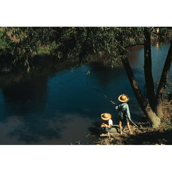 Bayou Fishing, 1940. /Ntwo Cajun Boys Fishing In A Bayou Creek In Schriever, Louisiana. Photograph By Marion Post Wolcott, June 1940. Poster Print by  (18 x 24)