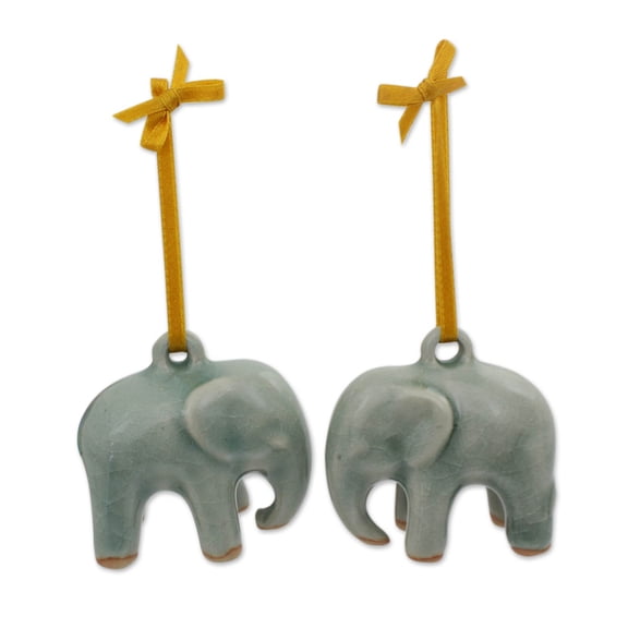 NOVICA Celadon ceramic ornaments, 'Light Blue Elephant' (pair)