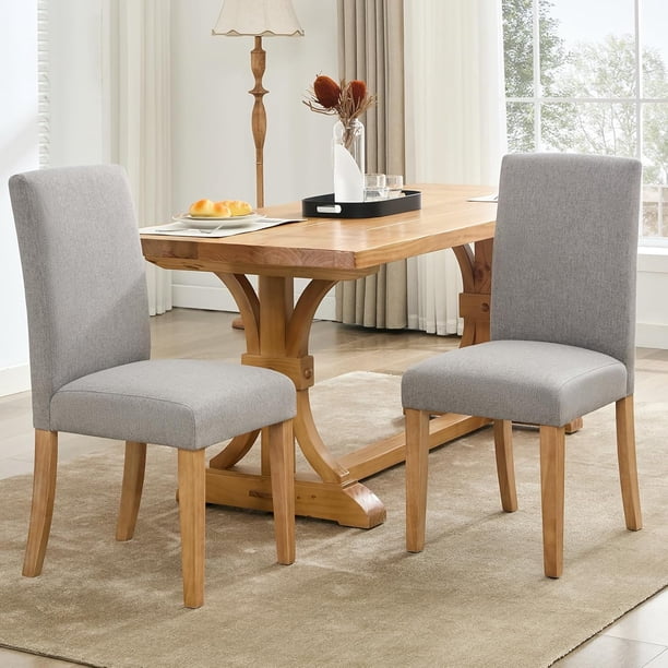 Elegant dining set: 2 gris fabric sillas con sturdy wood legs - perfect para your dining room