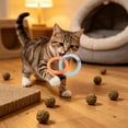 thumbnail image 6 of Soft Mesh Tube Donut Cat Toy with Bells, Interactive Teething Chew Ring for Indoor Cats, Crinkle Voice Kicking Toy for Tooth Th, Blue, by IHXORA, 6 of 6