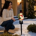thumbnail image 3 of LOWLHOME Solar Christmas Pathway Lights Outdoor, Dynamic LED Yard Stake Decor with Christmas Snowman, IP44 Waterproof Garden Lawn Patio Holiday Display Ambient Lights, 3 of 7