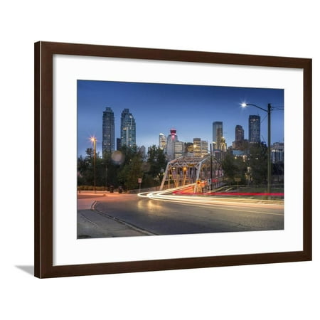 Calgary Imports Car trail lights through Macdonal Avenue bridge and Downtown skyline at dusk, Calgary, Alberta, Can Framed Print Wall Art By Frank Fell ()