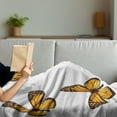 thumbnail image 3 of Butterfly Soft Flannel Fleece Throw Blanket, Monarch Moth Delicate Creature with Wings on Plain Backdrop, Cozy Plush for Indoor and Outdoor Use, 60" x 80", Earth Yellow Orange, by Ambesonne, 3 of 5