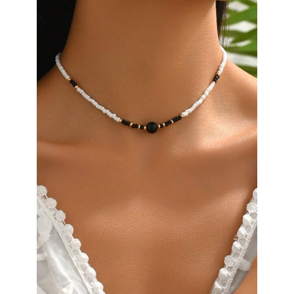 Black and White Beaded Choker Necklace With Goldtone Accents