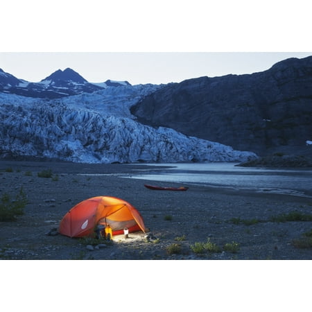 Glowing tent and kayak on the beach in front of Shoup glacier and mountains at dusk Shoup Bay State Marine Park Prince William Sound Valdez Southcentral Alaska Canvas Art - Kevin Smith  Design Pics