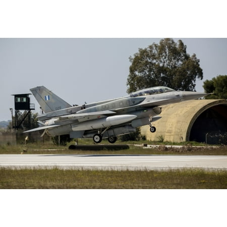 A Hellenic Air Force F-16D Block 52 with a DB-110 reconnaissance pod landing in front of the ex-nuclear QRA site at Araxos Air Base Greece Poster