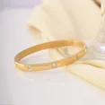 thumbnail image 3 of Triple Stone Minimalist Bangle Bracelet for Women, Sleek Everyday Jewelry with Cubic Zirconia, 925 Sterling Silver with 14K Gold Finish, 3 of 4