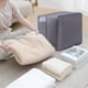 thumbnail image 5 of pstuiky Caja de almacenamiento de compresión para mantas y ropa de cama bolsa organizadora de armario de gran capacidad para ropa resistente a mudanzas y organización., 5 of 6