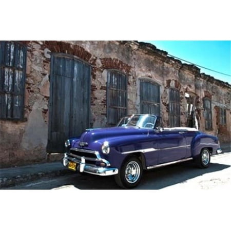 Classic 1953 Chevy Against Worn Stone Wall Cojimar Havana Cuba Poster Print by Bill Bachmann