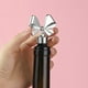 thumbnail image 4 of KDJ Elegant Bow Wine Stoppers Set of 2 - Sturdy Zinc Alloy Bottle Sealers for Holiday Parties, Silver Decorative Table Accessories, Perfect Gift for Wine Lovers, 4 of 9