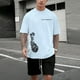 thumbnail image 1 of WILLBEST Conjunto de Traje para Hombre con Estampado de Oso para Uso Exterior E Informal. Combinación de Manga Corta y Pantalones Cortos para Verano. Ideal para Relajación y Actividades Físicas., 1 of 3