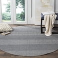 thumbnail image 2 of Safavieh Montauk Collection MTK330B Handmade Tassel Cotton Area Rug, 4' x 4' Round, Ivory / Navy, 2 of 3