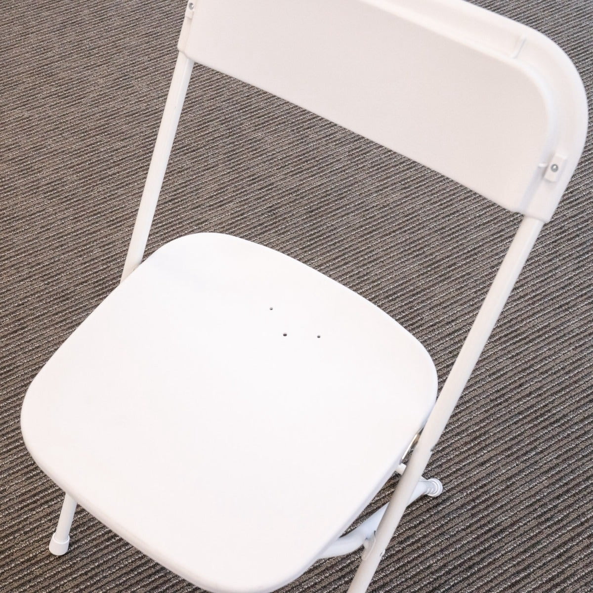TitanPRO™ Plastic Folding Chair with Drain Holes - White