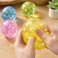 thumbnail image 4 of Coconut Oil Squishy with shiny flower and star sequins, Coconut Oil Slow Rising Squeeze Stress Ball Clear Jelly Bubblegum Texture Coconut Oil Squishy Toy,Yellow, 4 of 4