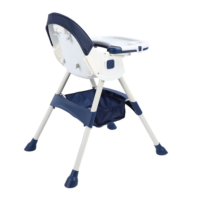 silla de comedor para niños, multiusos, altura ajustable, gran espacio, estable, segura, cómoda, trona para bebés pequeños 3/4 posterior; trona de plástico con asiento y respaldo acolchados azul marino, bandeja blanca extraíble, arnés de 5 puntos visible, patas crema con topes antideslizantes azul marino y cesto de almacenamiento inferior azul, adecuada también para juego y actividades.