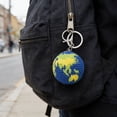 thumbnail image 1 of Adorno de Mochila con Diseño de la Tierra Tejido A Mano - Colgante de Planeta MNFD, 1 of 8