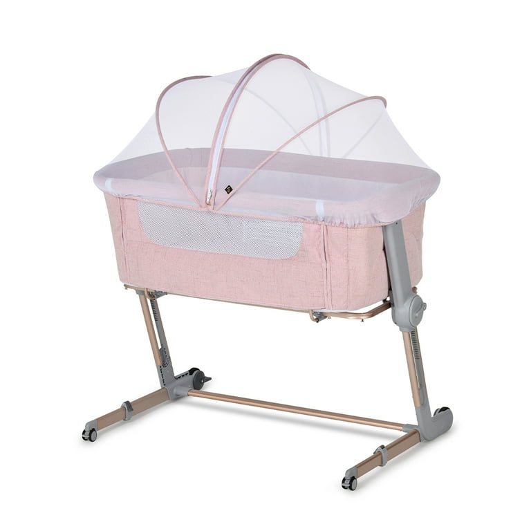 Chicco pink next to 2025 me crib