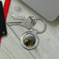 thumbnail image 4 of Wizard of Oz Wicked Witch Character Keychain Classy Round Chrome Plated Metal, 4 of 9