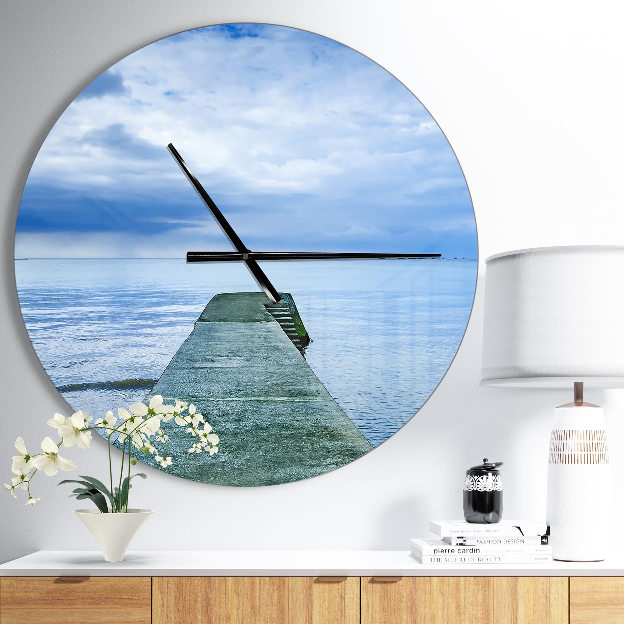 Designart 'Concrete Pier Under Cloudy Sky ' Modern wall clock