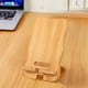 thumbnail image 1 of Soporte para teléfono Lisbinx de bambú y madera | Ángulo ajustable | Diseños desmontables | Para smartphones y tablets | Beige | Base antideslizante | Puerto de carga | Soporte para cuello, 1 of 7