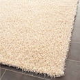 thumbnail image 4 of SAFAVIEH Clyde Solid Plush Polyester Shag Area Rug, Cream, 4' x 6', 4 of 7
