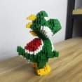 thumbnail image 2 of El juego de juguetes de bloques de construcción de dinosaurios ofrece una experiencia atractiva y educativa. Ensamble el Velociraptor verde y el Tyrannosauru., 2 of 5