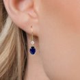 thumbnail image 3 of Gem Stone King 14K Yellow Gold Blue Sapphire and White Topaz French Wire Dangle Earrings for Women (1.26 Cttw, Gemstone September Birthstone, Oval 6X4MM and Round 2.5MM), 3 of 6