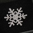 thumbnail image 4 of Broche navideño de copo de nieve con pedrería plateada, 4 of 5