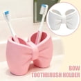 thumbnail image 2 of Plastic Bow Toothbrush Holder, 2-in-1 Countertop Pen Organizer, Nonslip Bathroom Accessory for Electric Toothbrush, Space-Saving Desk Decor for Home Office Dorm (Pink), 2 of 8