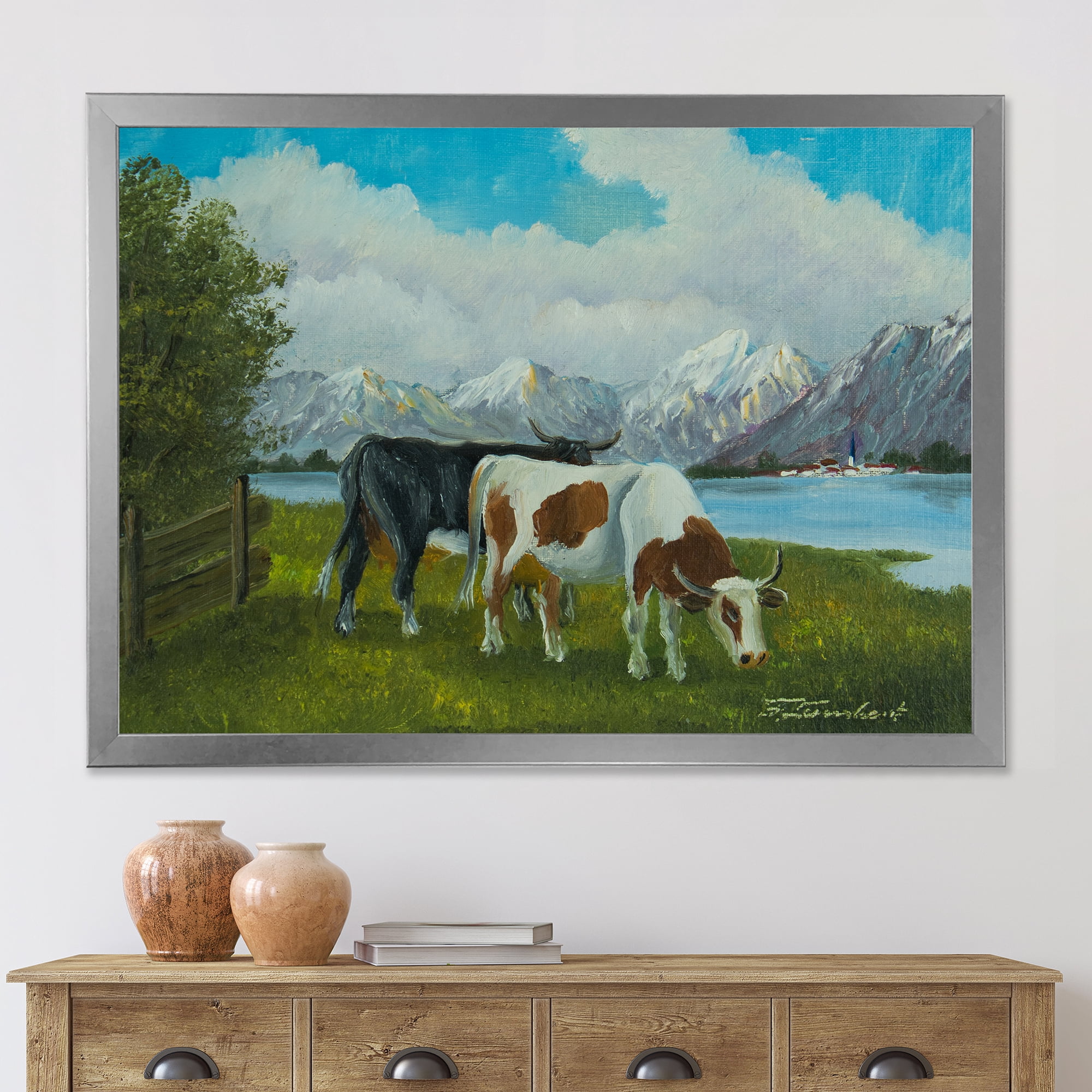 Designart 'Cows Eating Grass In Front Of A Lake' Farmhouse Framed Art Print