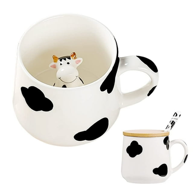 Mengcat 12Oz cute ceramic cow print coffee mug featuring a black and white cow pattern, a 3D cow figurine inside, and a sturdy handle. Includes a matching lid and spoon with cow print accents. Made of durable ceramic, this mug is dishwasher and microwave safe, ideal for hot beverages like coffee, tea, or hot chocolate. Measures 3.9 inches in diameter and 3.1 inches in height, with a 12-ounce capacity. A charming gift for women, girls, or anyone who loves kawaii designs.