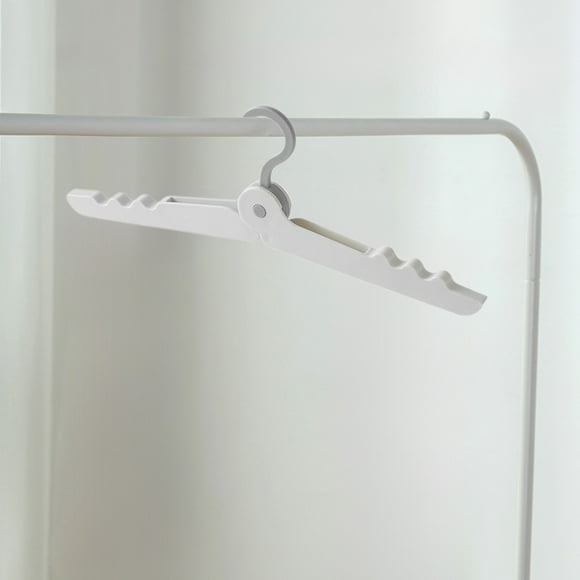 Foldable hanger portable multifunctional change travel home hanger space saving organizer Feature: Quantity: 1Pcs Colour: yellow Light green green White Material: Plastic Product