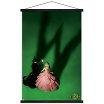 Wicked - Teaser One Sheet Wall Poster with Magnetic Frame, 22.375" x 34"