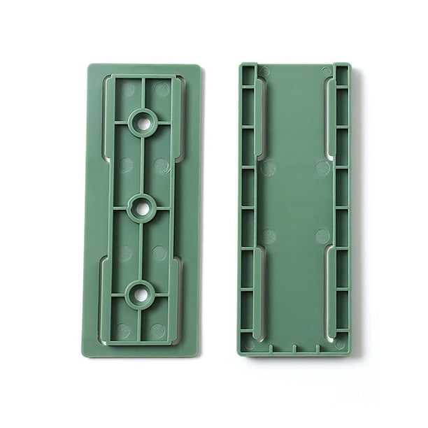 Retenedor de enchufe montado en la pared Soporte de fijador de toma de corriente para el hogar sin perforaciones (verde)