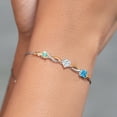 thumbnail image 4 of Gem Stone King 925 Silver and 10K Yellow Gold Mercury Mist Mystic Topaz Moissanite Swiss Blue Topaz and Lab Grown Diamond Tennis Bracelet for Women By Keren Hanan (2.15 cttw, Adjustable up To 9 inch), 4 of 4