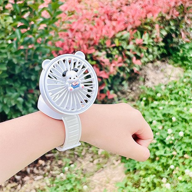 Lindo y súper lindo reloj con ventilador, carga USB, mini ventilador portátil para estudiantes y niños.