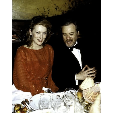 Meryl Streep and a friend sitting at a dining table Photo