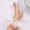 White, variant on Minimalist Summer Sandals And Slides with a Cool, Understated Design Feature a Round Toe And a Flat, Lightweight Build, Perfect for Women. They Pair Stylishly with Long Coats And Sharp Short Hair