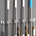 thumbnail image 1 of Soporte de escoba de acero inoxidable ACTIVE estante de almacenamiento 4 ranuras 5 ganchos, 1 of 5
