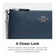 thumbnail image 4 of Wristlet Coach de piel granulada con cadena para mujer, 4 of 5